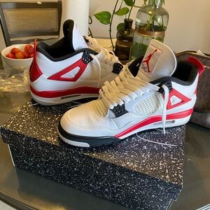 Jordan 4 retro red cements